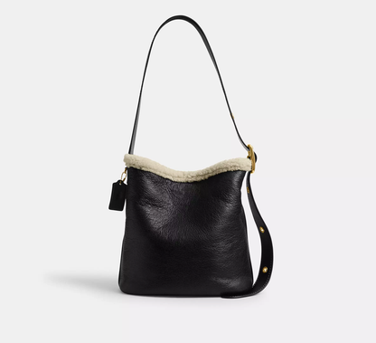 Shearling Trim Natural Grain Leather Adjustable Strap Bucket Bag With Detachable Zip Pouch