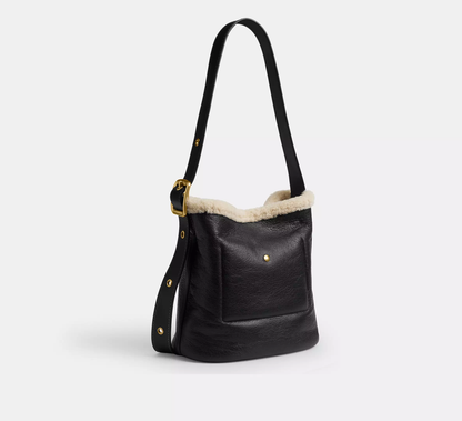 Shearling Trim Natural Grain Leather Adjustable Strap Bucket Bag With Detachable Zip Pouch